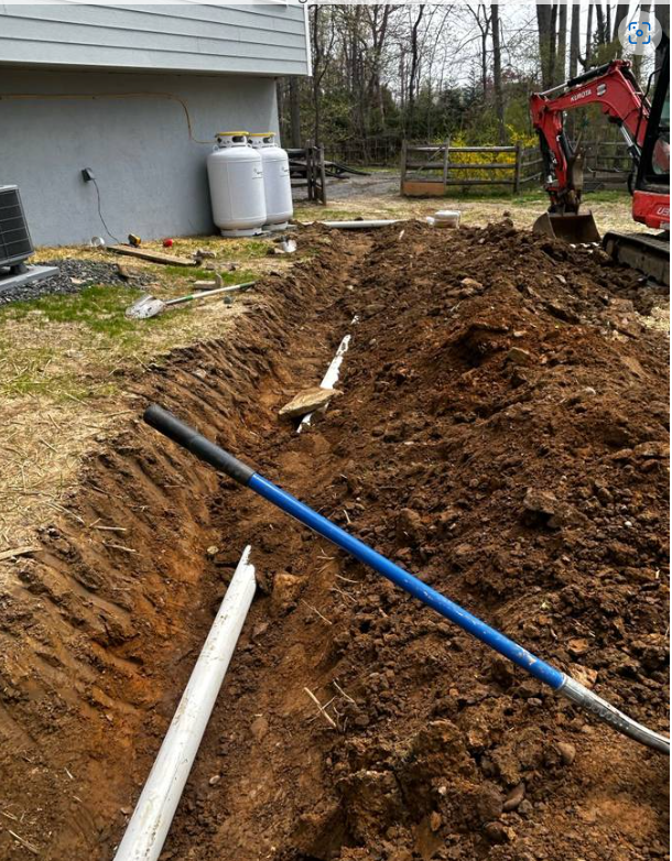 Trench excavated for a residential stormwater drainage system